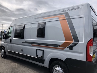 Commercially built camper van.