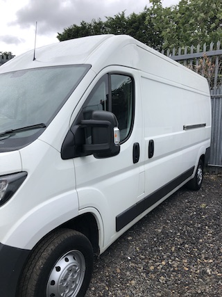 White panel van suitable for camper van conversion.