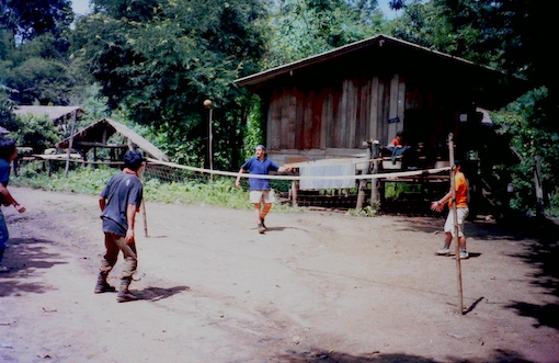 Playing volleyball in Thai village