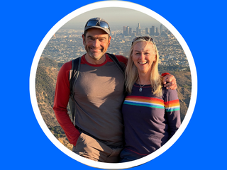 David and Sharon Schindler with view of LA behind them